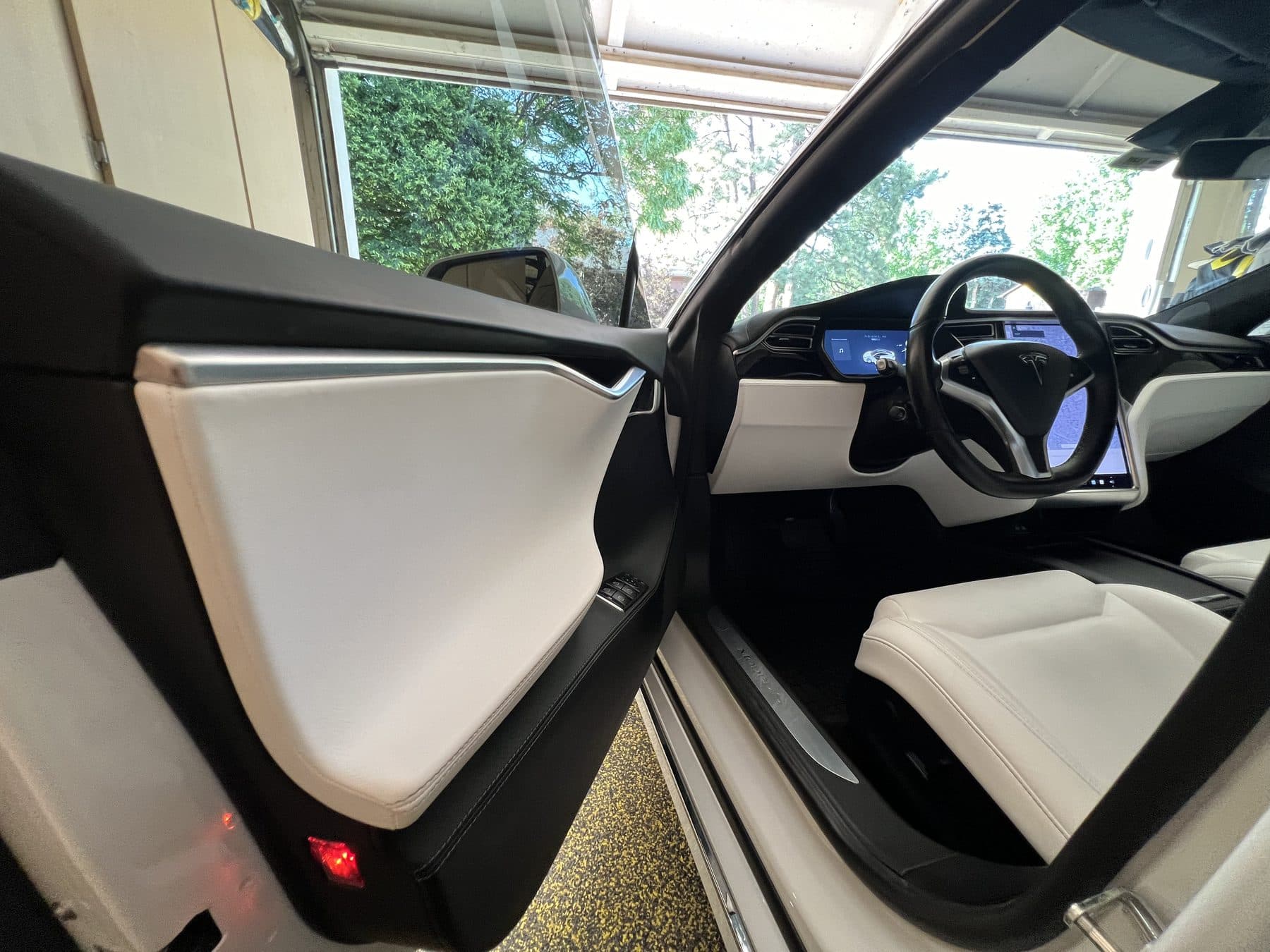 Tesla model x falcon wing door interior after detail
