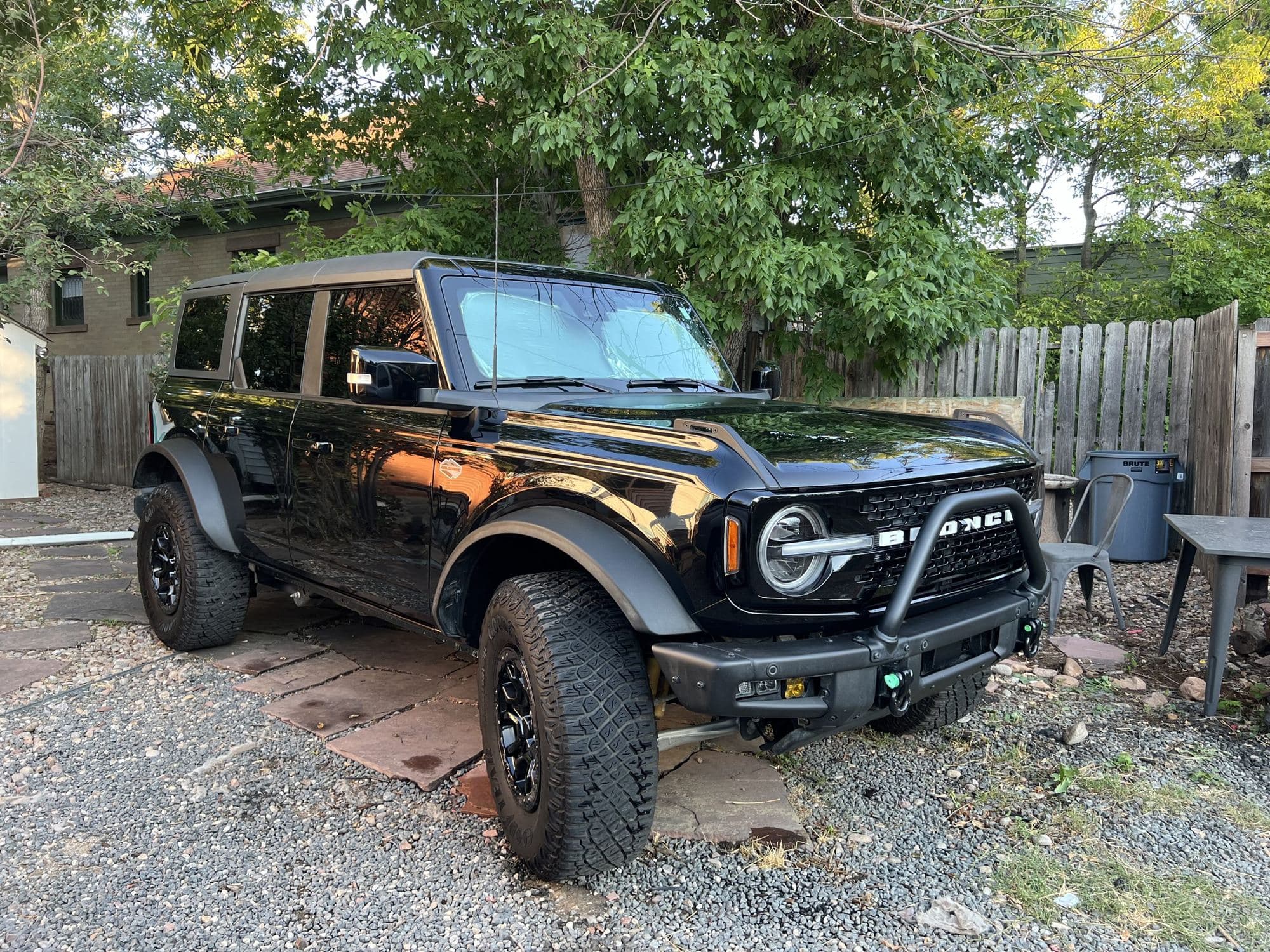 Black Ford Bronco after a full exterior detail, glossy at golden hour